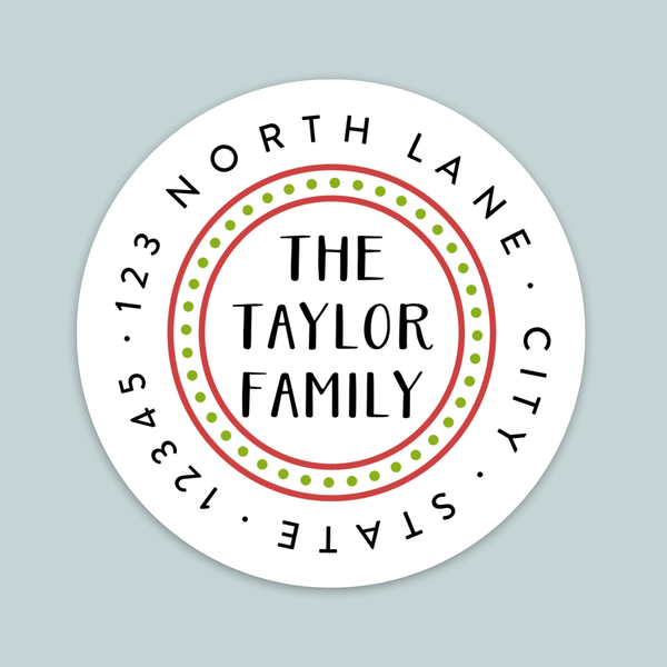 A circular stamp-like design with text and a border, featuring the text "The Taylor Family" in the center.