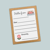 The image is a blank greeting card with a floral design and a pink flower. The card has a blank space for a message and a space for a signature.