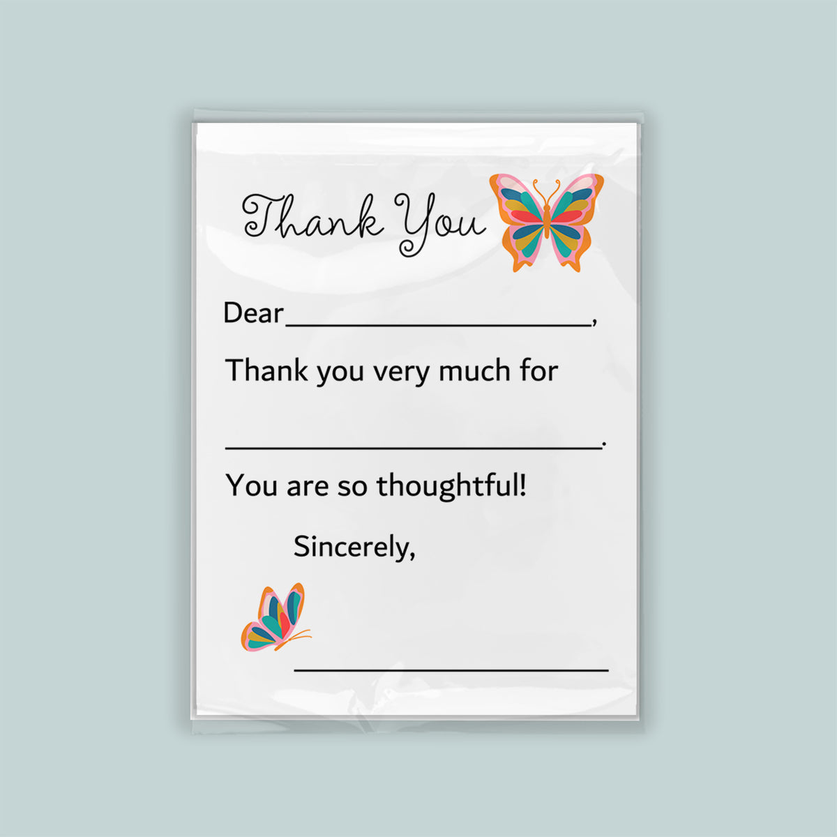 a white card with a message and two butterflies. The message is a "Thank You" card, expressing gratitude for something. The butterflies are decorative and add a touch of whimsy to the card. The card is not too long, as it contains only a few lines of text. The message is simple and direct, focusing on the recipient rather than providing unnecessary details.