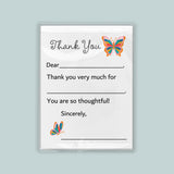 a white card with a message and two butterflies. The message is a 
