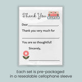The image is a printed thank you card with a pink flower and a pink flower on the left side. The card is pre-packaged in a resealable cellophane sleeve.