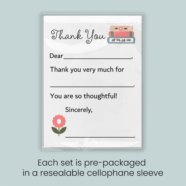 The image is a printed thank you card with a pink flower and a pink flower on the left side. The card is pre-packaged in a resealable cellophane sleeve.