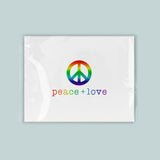 A white square with a peace sign and the text 