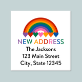The image is a white square with a rainbow graphic and the text 
