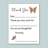 a blank thank you card with a butterfly design. The card has a space for a message and a space for a signature. The text on the card is not described, and it is not a collage of multiple images. The card does not contain any redundancy or vague wording, and it does not begin with phrases like 