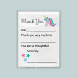 The image is a white thank you card with a unicorn illustration and stars. The card has a blank space for a recipient's name and a message expressing gratitude.