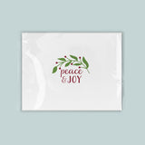 A white envelope with a holiday-themed design and text on it.