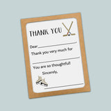 The image is a thank you card with a hockey stick and skates on the front, and it is placed on a light blue background.