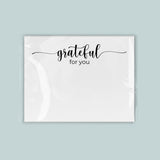 The image is a white square with the text 