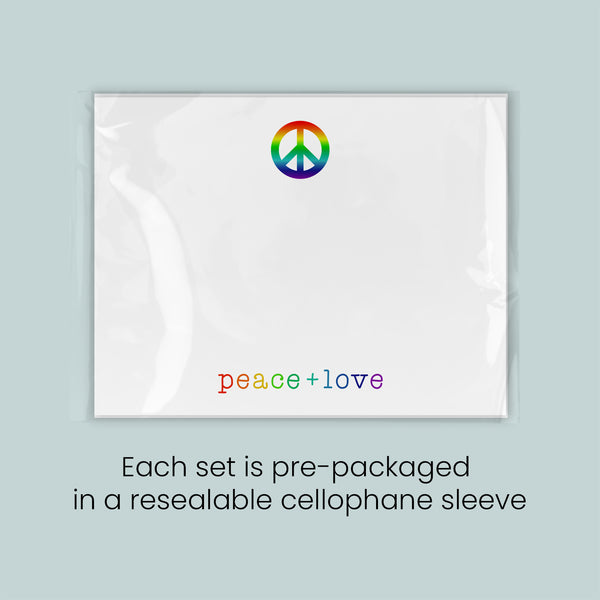 The image is a white rectangular card with a peace symbol and the text "Peace + Love" printed on it. Each set is pre-packaged in a resealable cellophane sleeve.