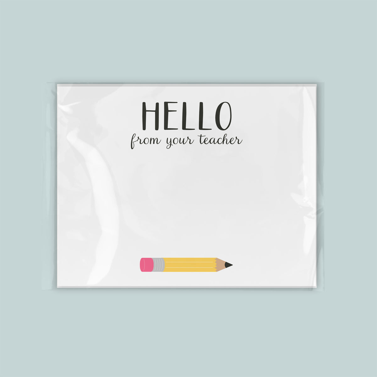 A greeting card with the text "Hello from your teacher" written on it, along with a pencil illustration.