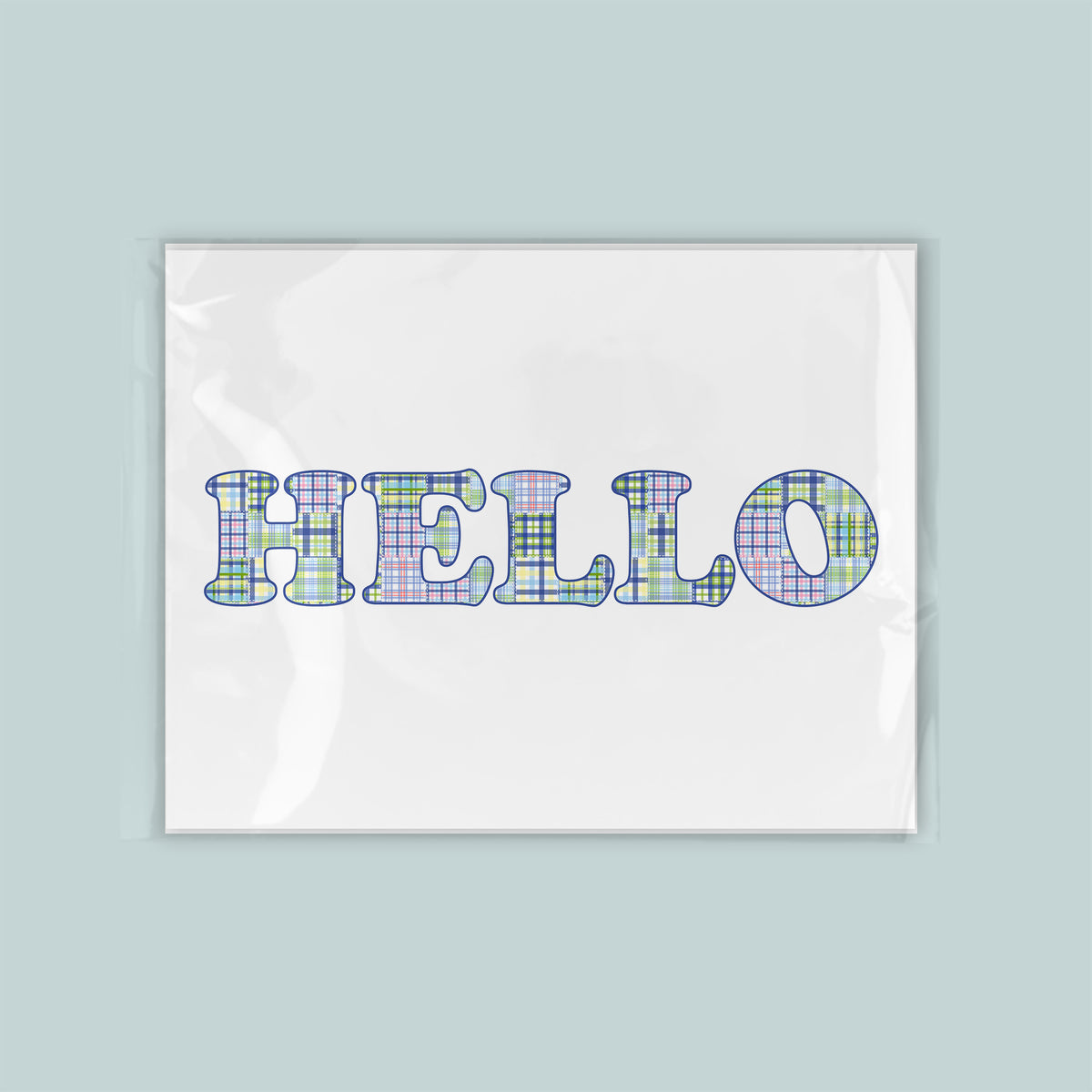 A white background with the word "HELLO" written in a colorful, plaid-like font.