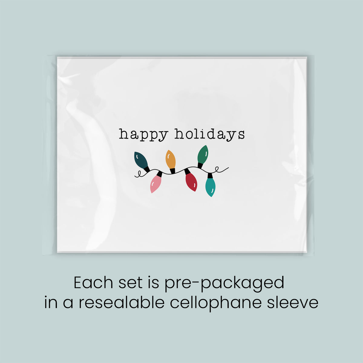 The image is a set of pre-packaged greeting cards, each set in a resealable cellophane sleeve.