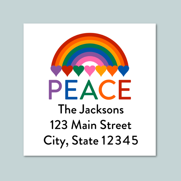 The image is a square-shaped postcard with a rainbow graphic and the word "PEACE" written in a colorful, stylized font.