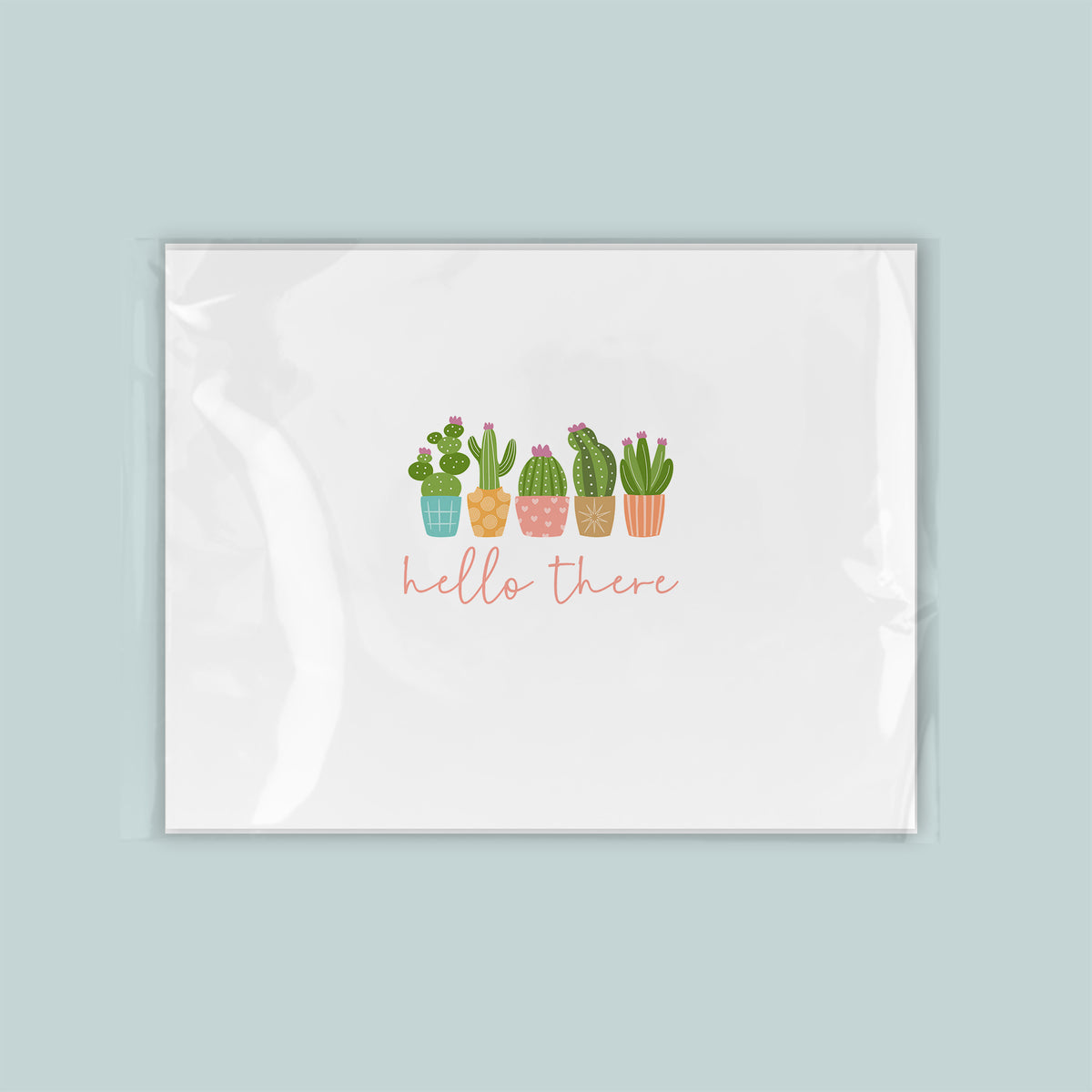 A white background with a graphic design featuring a row of colorful cacti and the text "Hello there" written below them.