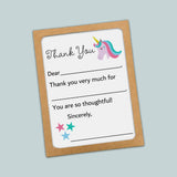 The image is a framed thank you card with a unicorn illustration and stars. The card has a blank space for a message and a blank space for a recipient's name.
