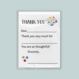 The image is a white thank you card with a space-themed design, including planets and stars. The card has a blank space for a recipient's name and a message expressing gratitude.