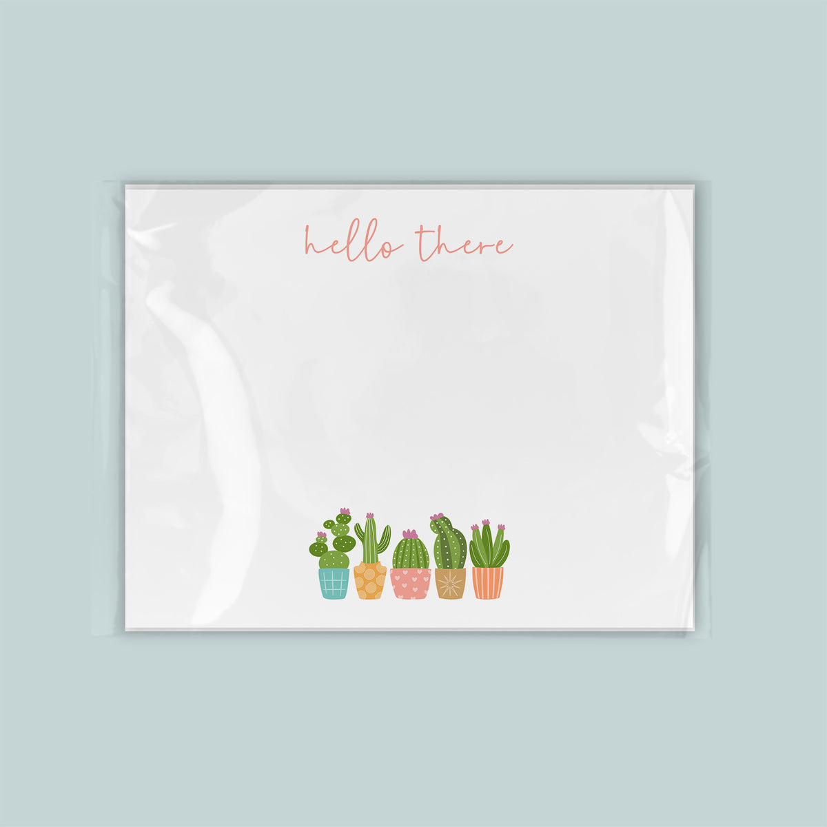 A white background with a line of colorful cacti in pots, accompanied by the text "Hello there" written in cursive.