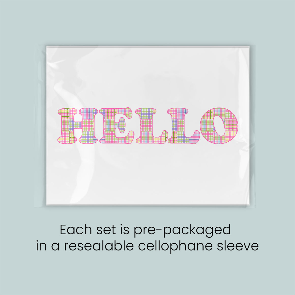 a pre-packaged set of colorful plaid lettering on a white background, with the text "HELLO" prominently featured. Each set is pre-packaged in a resealable cellophane sleeve.