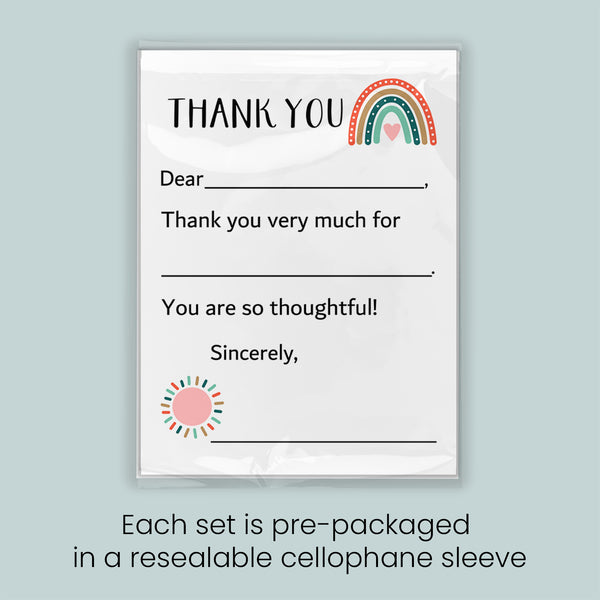 The image is a thank you card with a rainbow graphic and a heart symbol. The card is pre-packaged in a resealable cellophane sleeve.