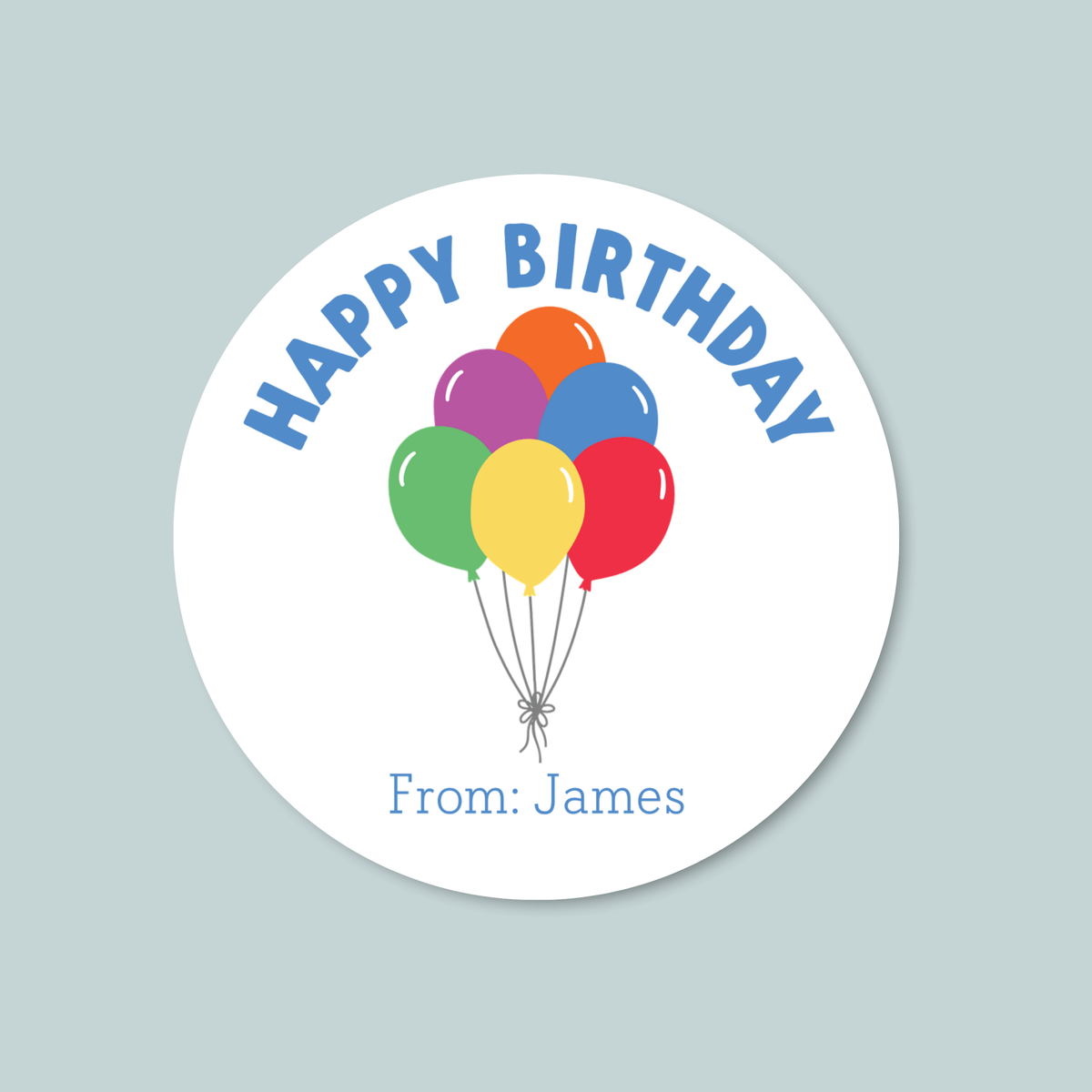 A round sticker with a colorful bunch of balloons and the text "HAPPY BIRTHDAY From: James" printed on it.