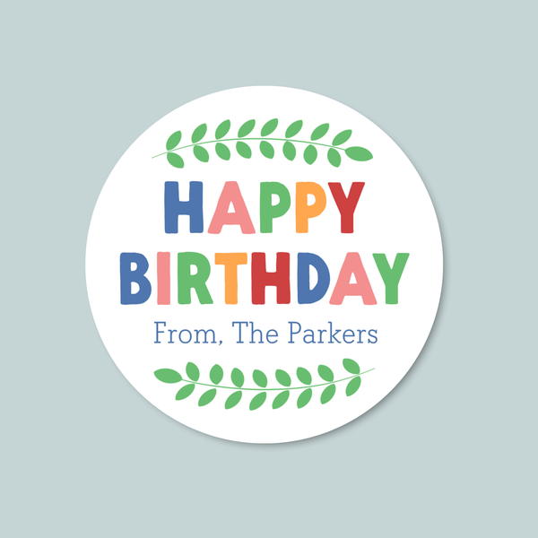 A round sticker with the text "HAPPY BIRTHDAY From. The Parkers" in a colorful, stylized font.