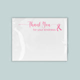 A white card with a pink ribbon symbol and the text 
