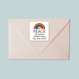 A light pink envelope with a white label that says 