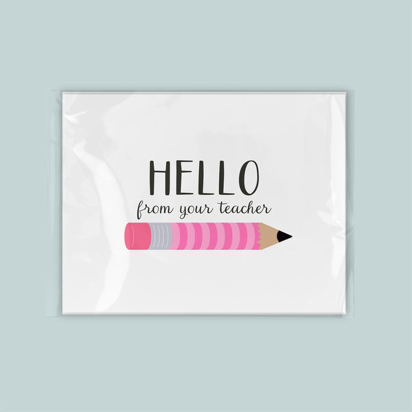 A greeting card with a pink pencil and the text "Hello from your teacher" printed on it.