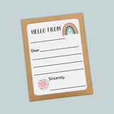 The image is a greeting card with a blank space for a message and a rainbow graphic.