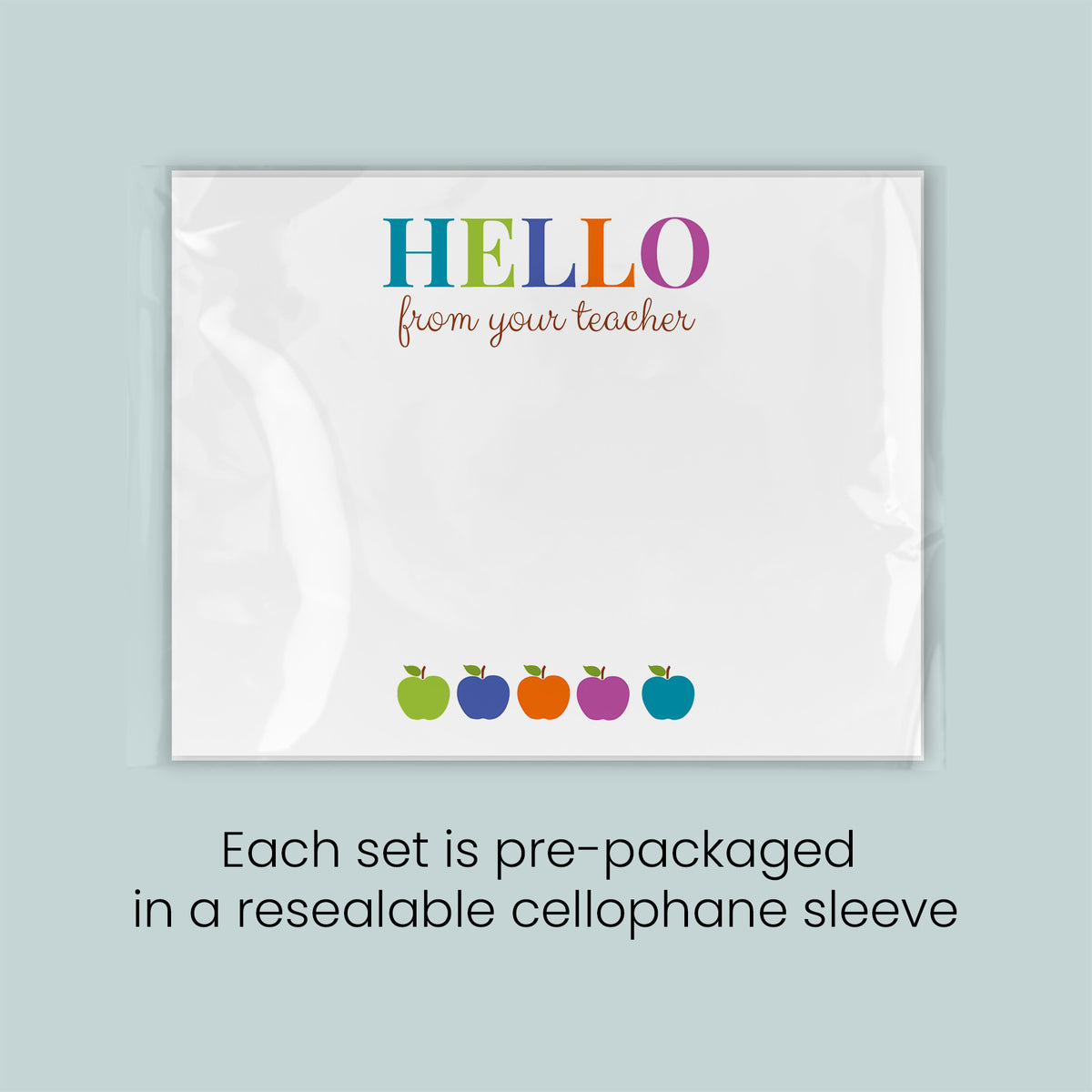 The image is a greeting card with a message that says "Hello from your teacher" and features four colorful apples arranged in a row. Each set is pre-packaged in a resealable cellophane sleeve.
