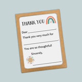 The image is a simple, handwritten thank you card with a rainbow graphic and a sun-like symbol. The card has a blank space for a response, and the text is written in a casual, friendly tone.