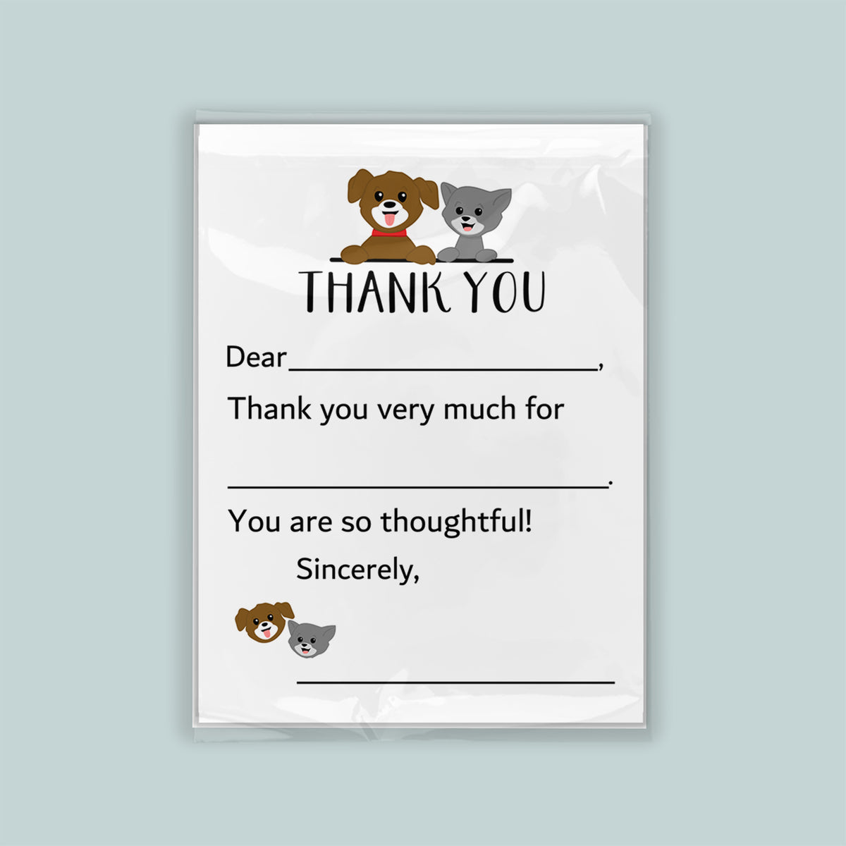The image is a white thank you card with a cartoon dog and cat illustration. The card has a blank space for a recipient's name and a message expressing gratitude.