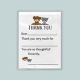 The image is a white thank you card with a cartoon dog and cat illustration. The card has a blank space for a recipient's name and a message expressing gratitude.