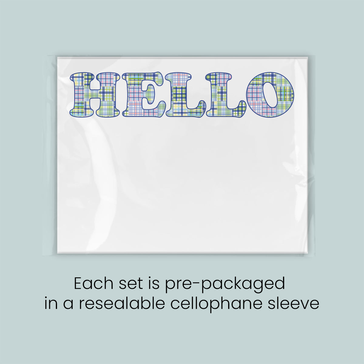 a set of pre-packaged greeting cards with the word "HELLO" written in a colorful, plaid pattern on a white background. Each set is pre-packaged in a resealable cellophane sleeve.