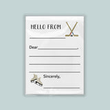 The image is a white envelope with a hockey stick and skates on the front, along with a blank greeting card space for a message.