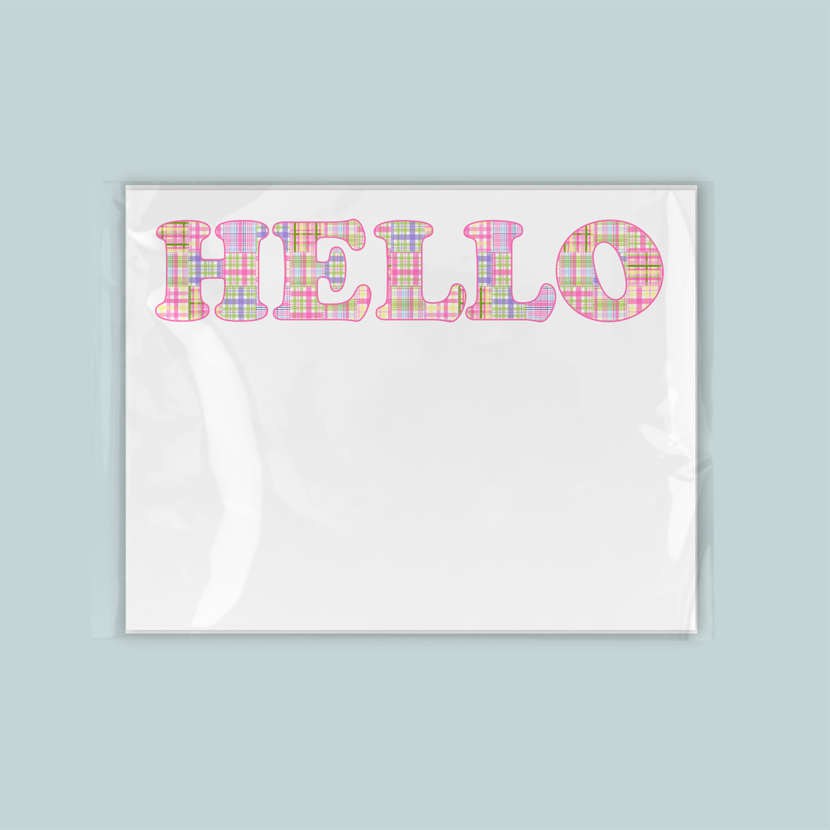 A white background with the word "HELLO" written in a colorful, plaid-like font.