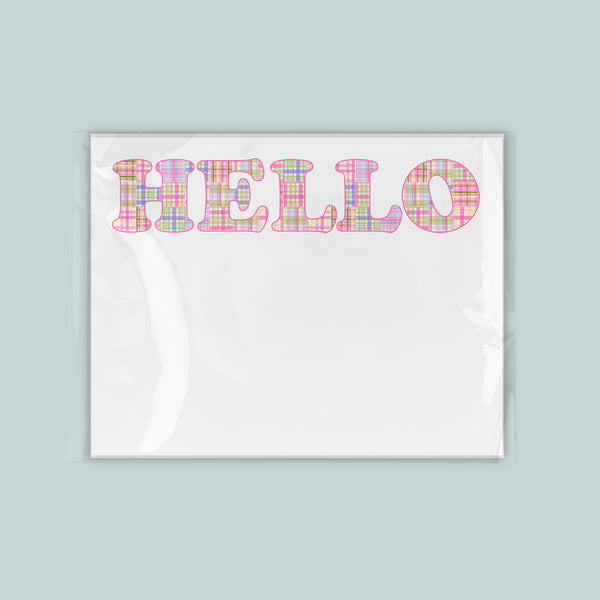 A white background with the word "HELLO" written in a colorful, plaid-like font.