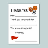 a blank thank you card with a sports theme, featuring a football, basketball, and soccer ball. The card is blank, so there are no words to describe.