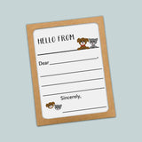 The image is a greeting card with a brown frame and a white background. The card has a message that reads 
