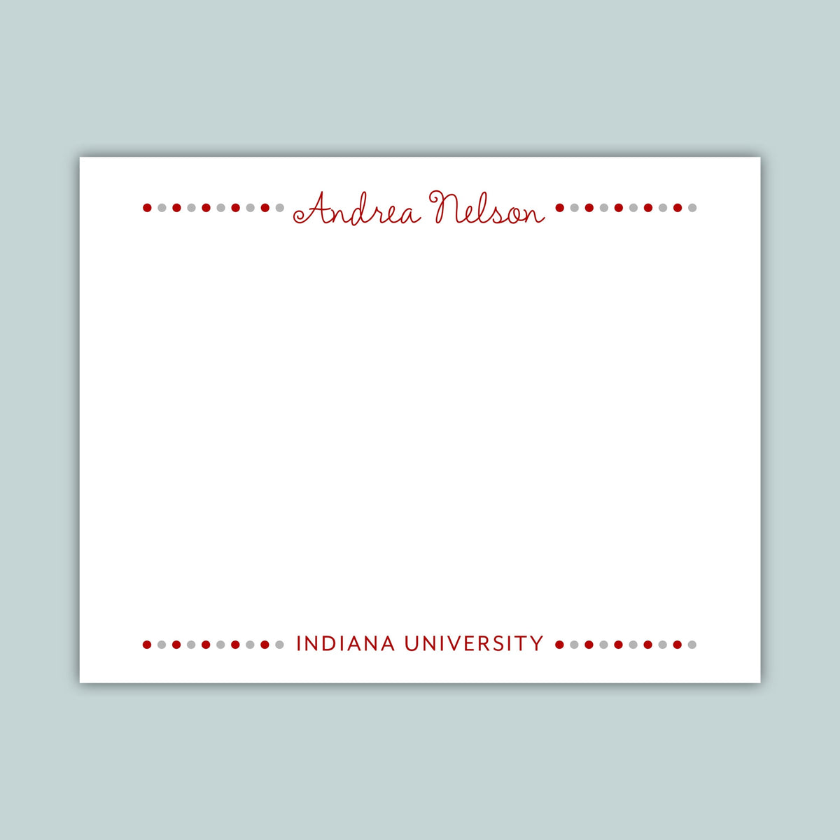White card with red text displaying a name and institution on a light gray background